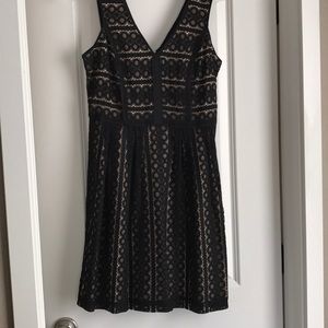 Gorgeous gold, black dress. Fit and flare.